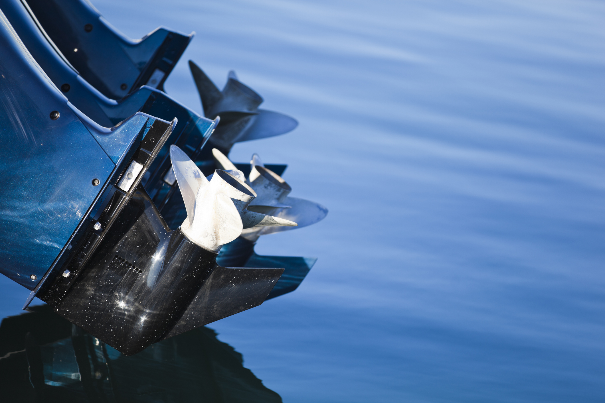 Close Up Of A Boat's Outboard Motor And Propellers